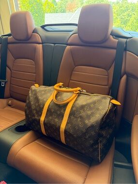 Louis Vuitton Monogram Duffel Bag in Brown with Tan Trim